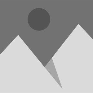 Gray placeholder image icon featuring two mountain peaks in light gray against a dark gray background, with a circle representing the sun or moon above—ideal for electricians Rhode Island websites.